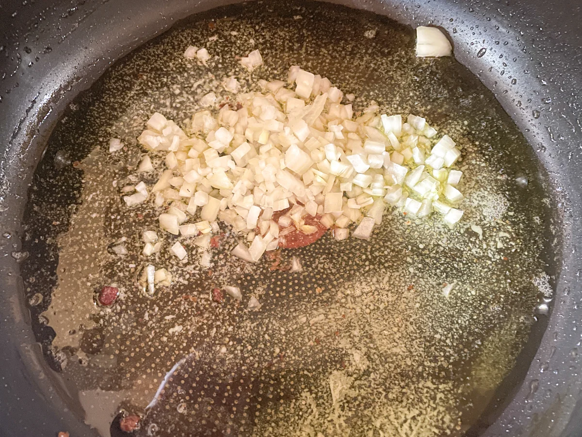 Chopped onion being fried