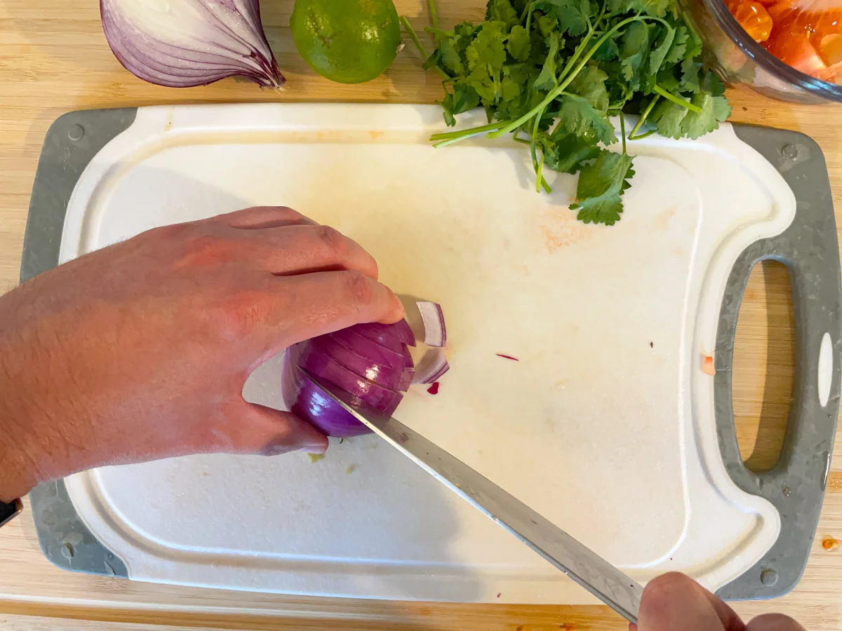 Chopping a red onion