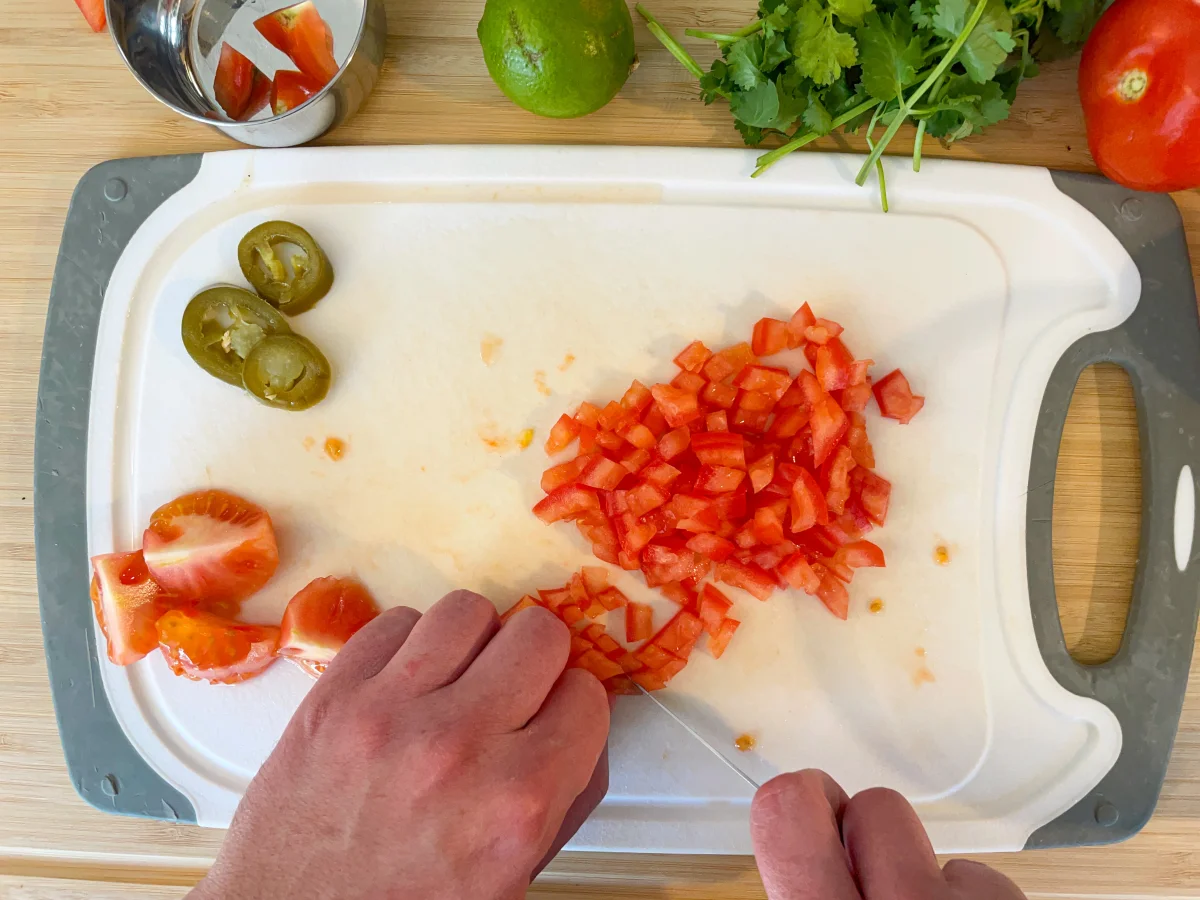 Chopping the tomatoes