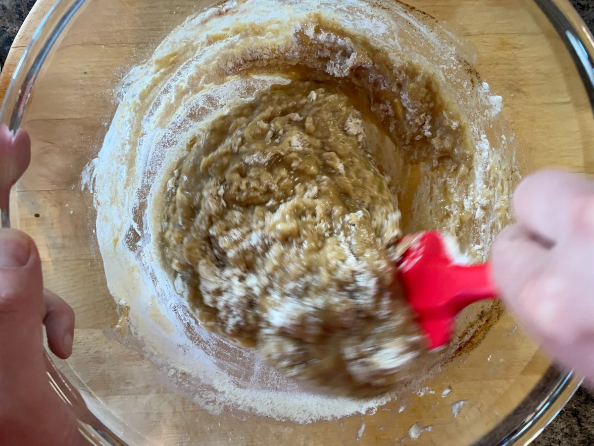 Folding flour into the muffin batter