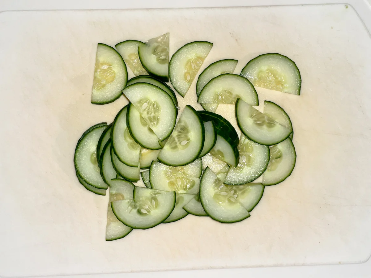 Half moons of thinly sliced cucumber