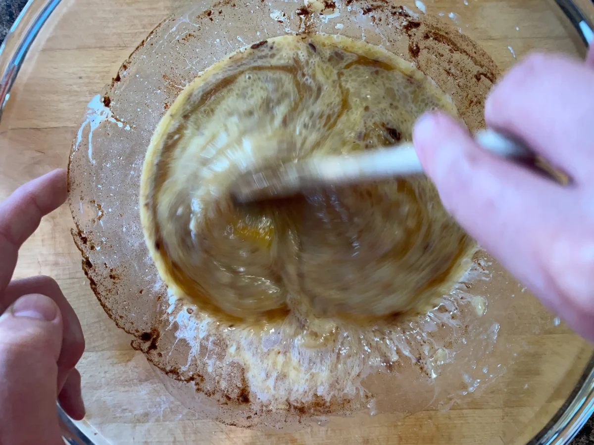 Mixing the wet ingredients for the banana muffins