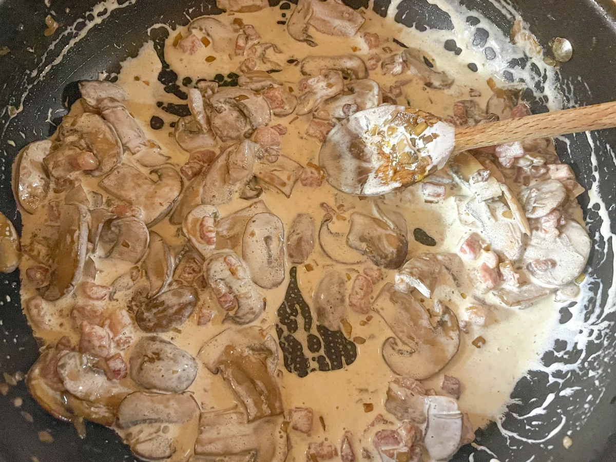 Pancetta and cream added to the mushrooms