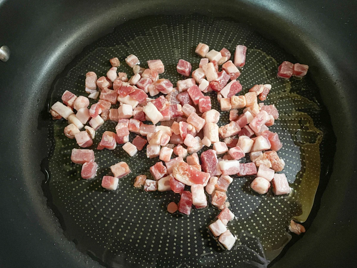 Pancetta being fried