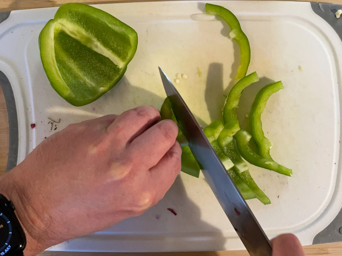 Slicing a green pepper